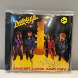 DOKKEN - UNDER LOCK AND KEY (AUTOGRAFADO)